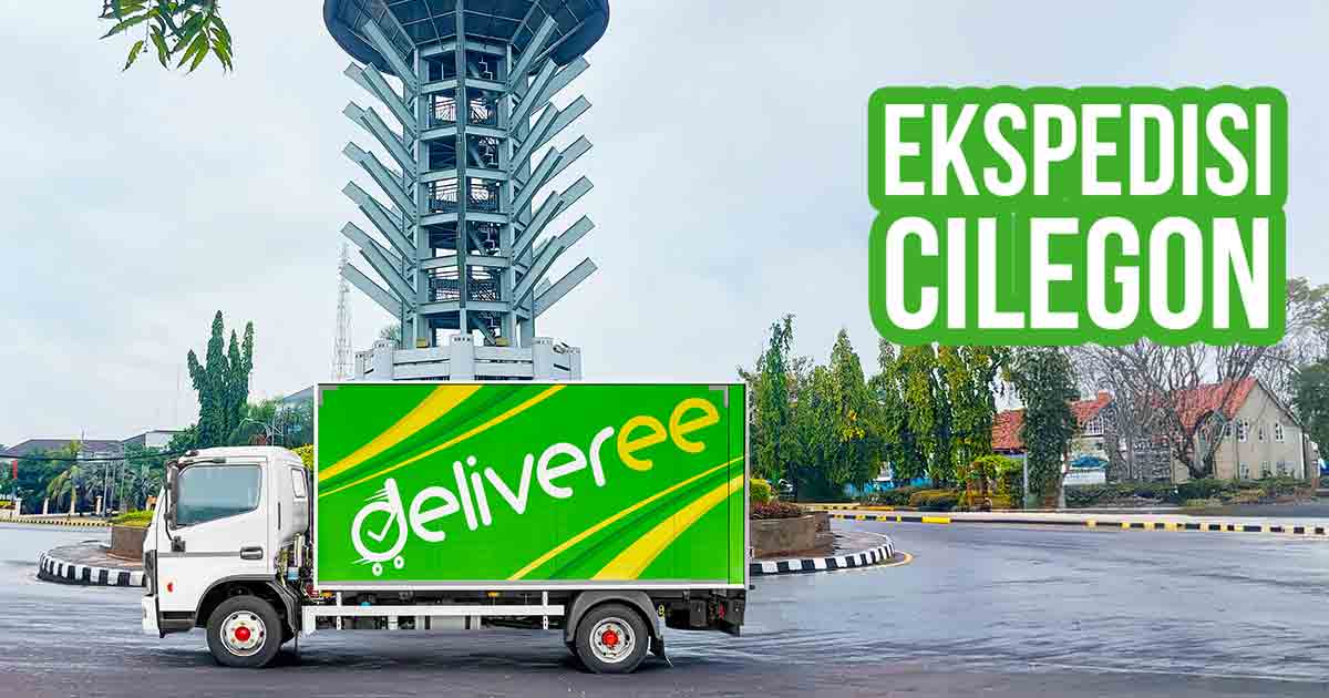 ​​Truk Deliveree melintasi jalan di depan Tugu Kota Cilegon untuk ekspedisi Cilegon.