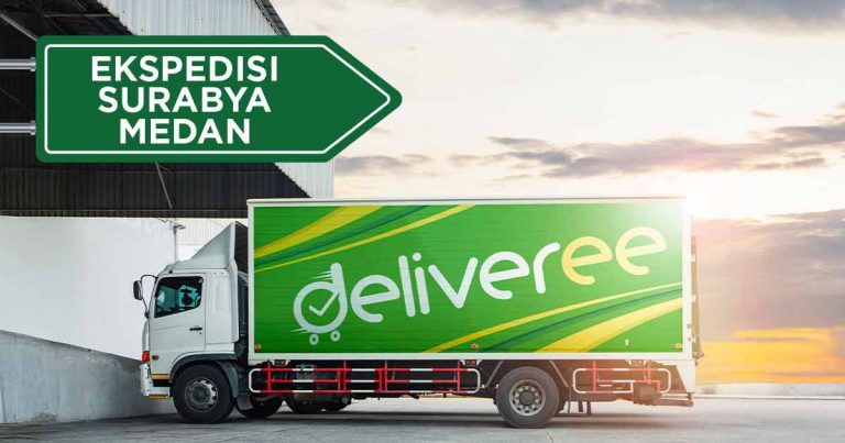 Truk ekspedisi Deliveree Surabaya-Medan di depan gudang saat matahari terbit.