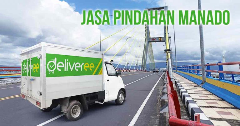 "Truk Deliveree melintasi Jembatan Soekarno di Manado untuk layanan pindahan rumah.