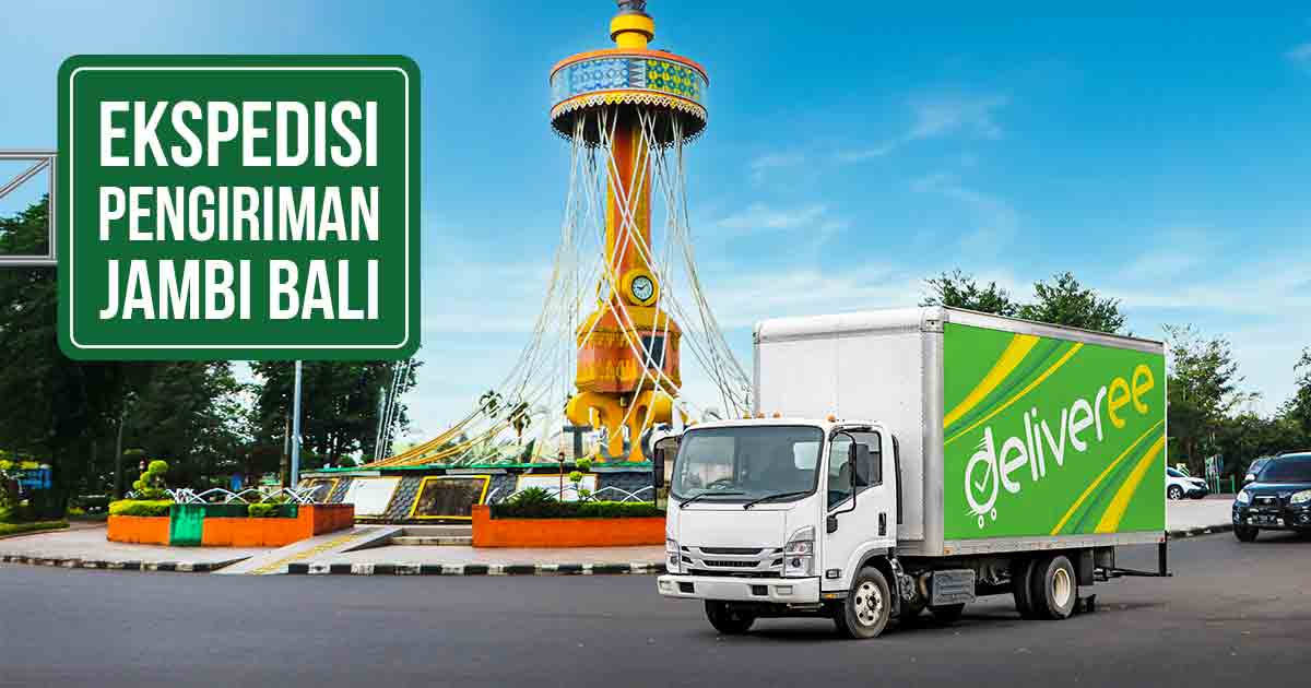 Truk Deliveree melewati monumen tugu Selamat Datang di Kota Jambi, terdapat tulisan “Ekspedisi Pengiriman Jambi Bali” di kanan atas.